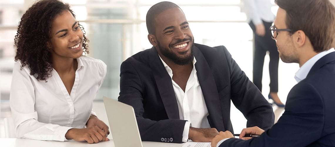 Diverse team of professionals engaging in a customer service strategy discussion.